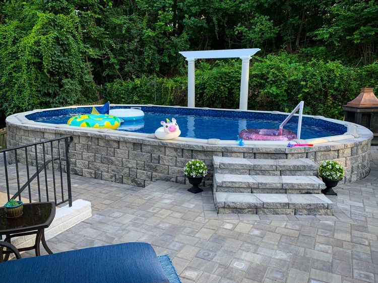 Raised pool with paver patio by MG Minor Construction in Warrenton VA