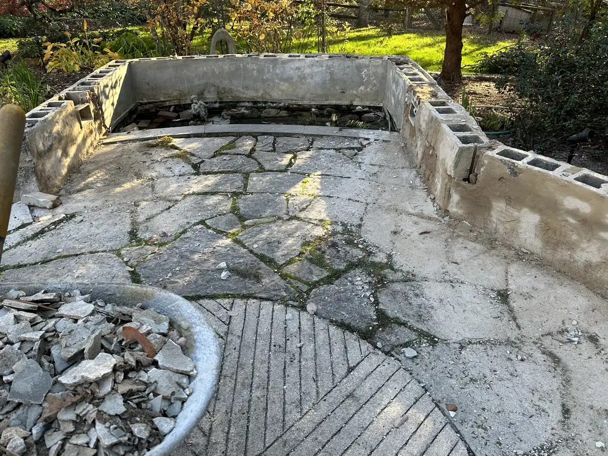 Courtyard patio seating wall rebuild in progress by MG Minor Construction in Marshall VA