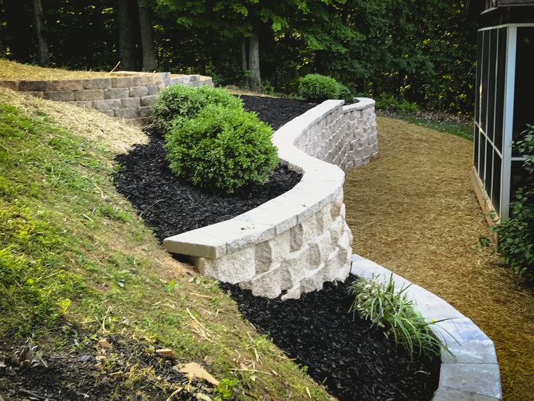 Curved retaining wall by MG Minor Construction in Warrenton VA
