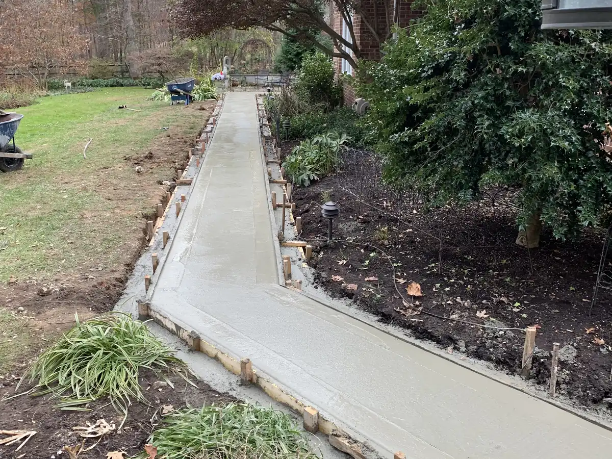 Freshly poured concrete walkway by MG Minor Construction in Marshall VA