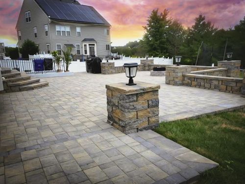 Paver patio with stone pillars by MG Minor Construction concrete contractor in Warrenton VA