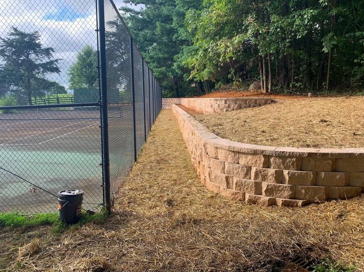 Tennis court retaining wall by MG Minor Construction in Warrenton VA
